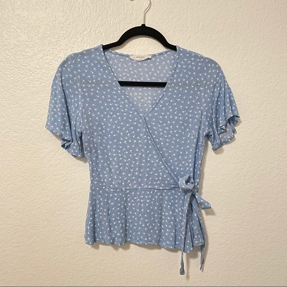 Blue Wrap top with white flowers